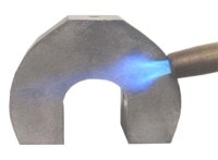 heating a magnet with a torch